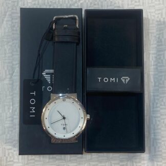 Tomi watch with white dial, black leather band, and stainless steel case