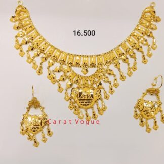 This exquisite 21k gold bridal necklace and earring set is a cherished investment that will become a treasured heirloom to be passed down through generations. It's a beautiful reminder of your special day and a symbol of everlasting love.