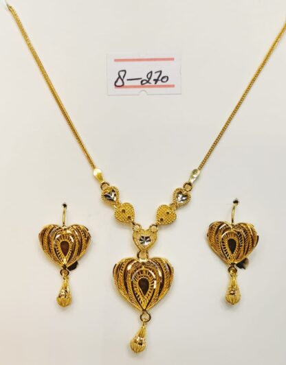 Indulge in timeless elegance with this exquisite necklace and earrings set, crafted from radiant 21k gold.