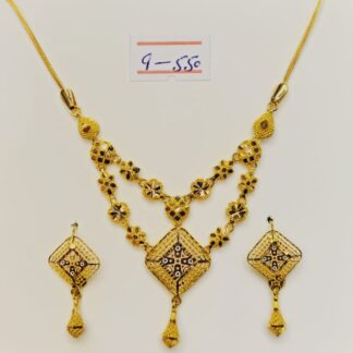 Indulge in timeless elegance with this captivating 21k gold set, featuring a stunning pendant suspended from a unique square mesh chain