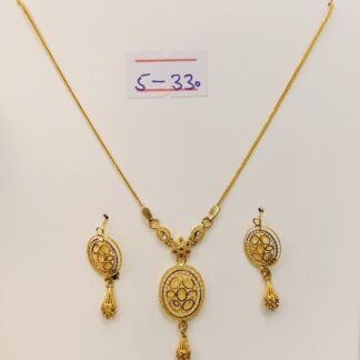 Add a touch of timeless elegance with this stunning 21K gold ball pendant necklace and earring set.