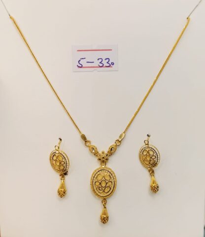Add a touch of timeless elegance with this stunning 21K gold ball pendant necklace and earring set.