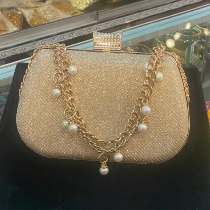 Opulent Pearl and Gold Chain Clutch