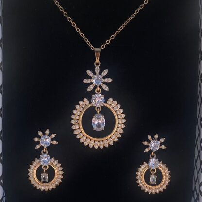 This enchanting pear-shaped pendant set features a luminous moonstone center accented with sparkling cubic zirconia.