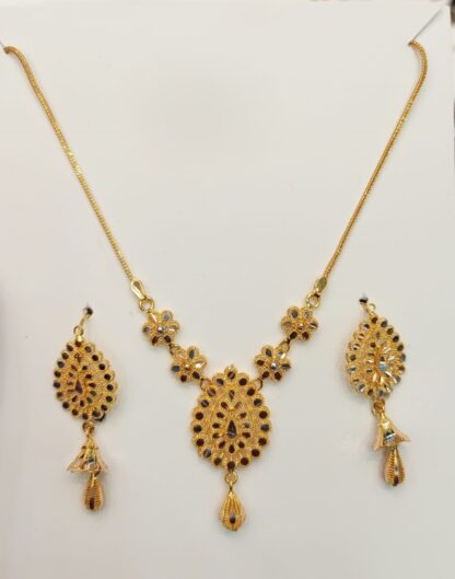 A delicate 21k gold necklace offers high gold purity (87.5%) for a rich color and luxurious feel, balancing elegance with durability for special occasions or daily wear.