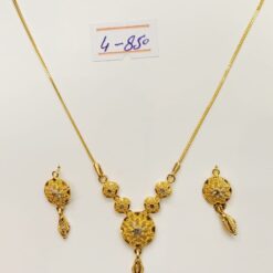 Elevate your style with this sleek and sophisticated 21K gold necklace and earring set featuring a modern minimalist design.