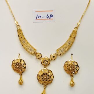 A stunning 21k gold necklace and earring set, showcasing intricate filigree work and traditional jhumki-inspired accents. Perfect for special occasions or as a timeless heirloom.