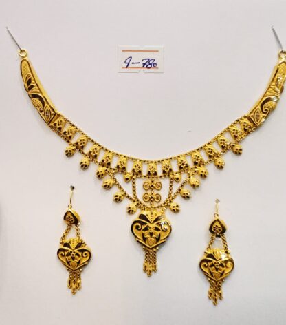 Ornate Gold Necklace and Earrings Set with Filigree Detailing