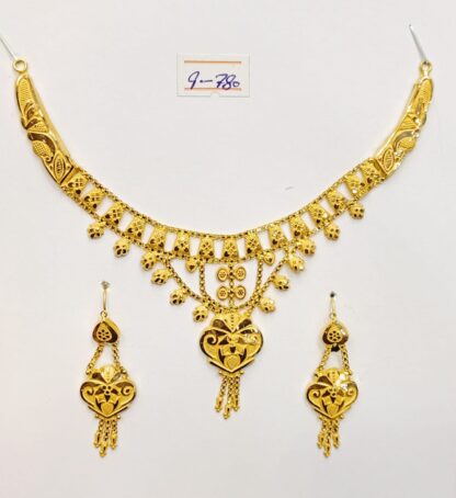 Ornate Gold Necklace and Earrings Set with Filigree Detailing