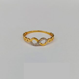Elegant 21K gold ring featuring three bezel-set stones in a delicate open band design