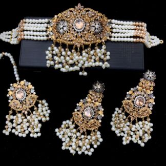 Elegant champagne-toned bridal choker set with antique gold Kundan work, pearl drops, earrings, and tikka – timeless wedding jewelry – Carat Vogue