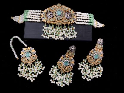 Fresh mint green choker necklace with gold Kundan, pearl drops, earrings, and maang tikka – perfect for haldi or mehndi functions – Carat Vogue