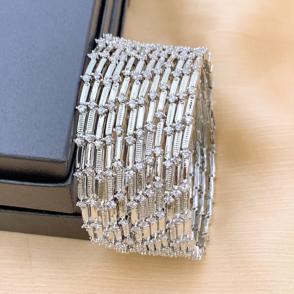Silver Plated AD Stone Zig-Zag Bangle Set for Women Silver Plated AD Stone Zig-Zag Bangle Set for Women by Carat Vogue