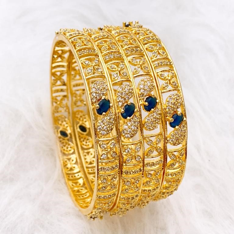 Gold-Plated American Diamond (AD) Bangles with Sapphire-Blue Stones (Set of 4) Gold-Plated American Diamond (AD) Bangles with Sapphire-Blue Stones (Set of 4)
