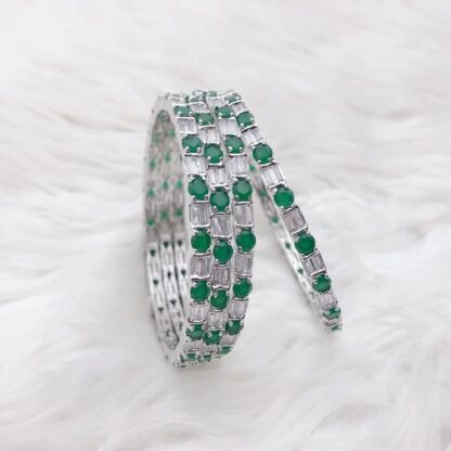 Luxury Silver Plated AD Stone Bangle Set with Emerald Green Highlights featuring American Diamond and Emerald Green stones by Carat Vogue