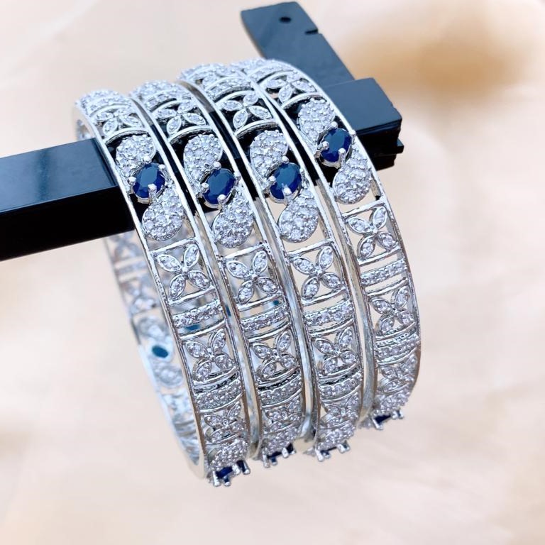 Rhodium Plated American Diamond Bangles with Blue Sapphire Stones Rhodium Plated American Diamond Bangles with Blue Stones