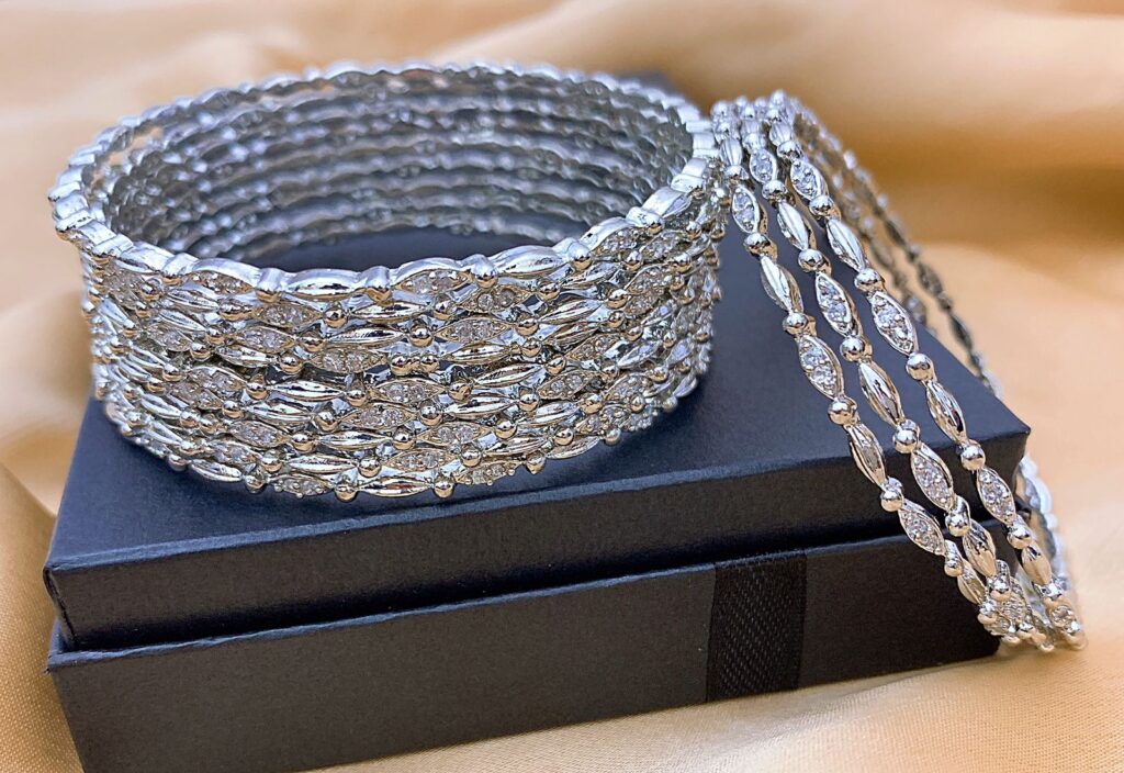 Modern cubic zirconia American Diamond bangles set in silver finish for women in the USA. Designed with brilliant clear stones in a sleek stackable style, ideal for weddings, evening wear, and elegant formal events.