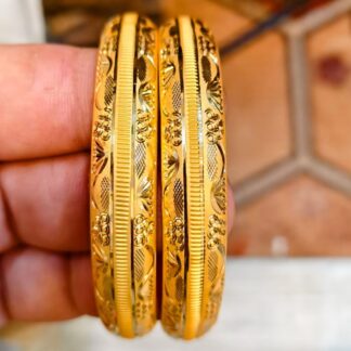 15 gram 22k solid gold bangle pair with floral vine and textured design