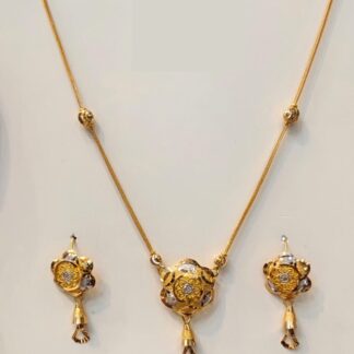 Elegant 22ct solid gold flower jewellery set displaying a flat openwork filigree floral disc pendant necklace and matching drop earrings.