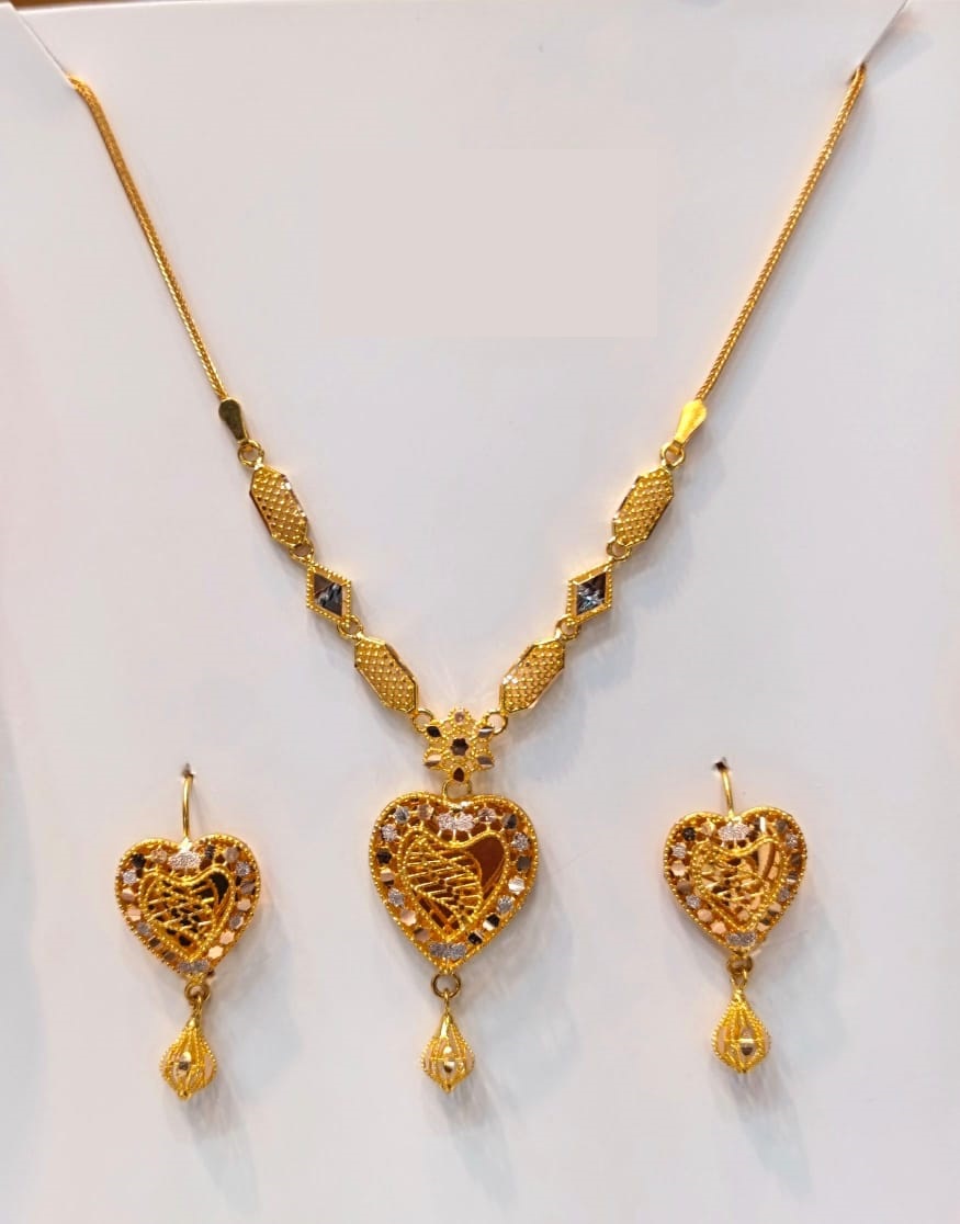 22k Gold Heart Pendant Necklace and Earrings Set 11g | Luxury 22ct Solid Gold Asian Bridal Jewellery Set for Women Shop our luxury 22k gold heart pendant necklace and matching earrings set. Crafted in certified 22ct solid gold for the ultimate UK bridal elegance.