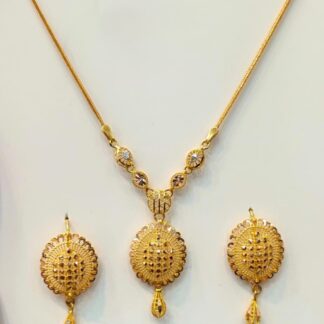 Shop a distinctive 22K gold lattice medallion necklace and matching drop earrings. Traditional-inspired yellow gold jewelry designed for weddings, bridal events and special occasions.